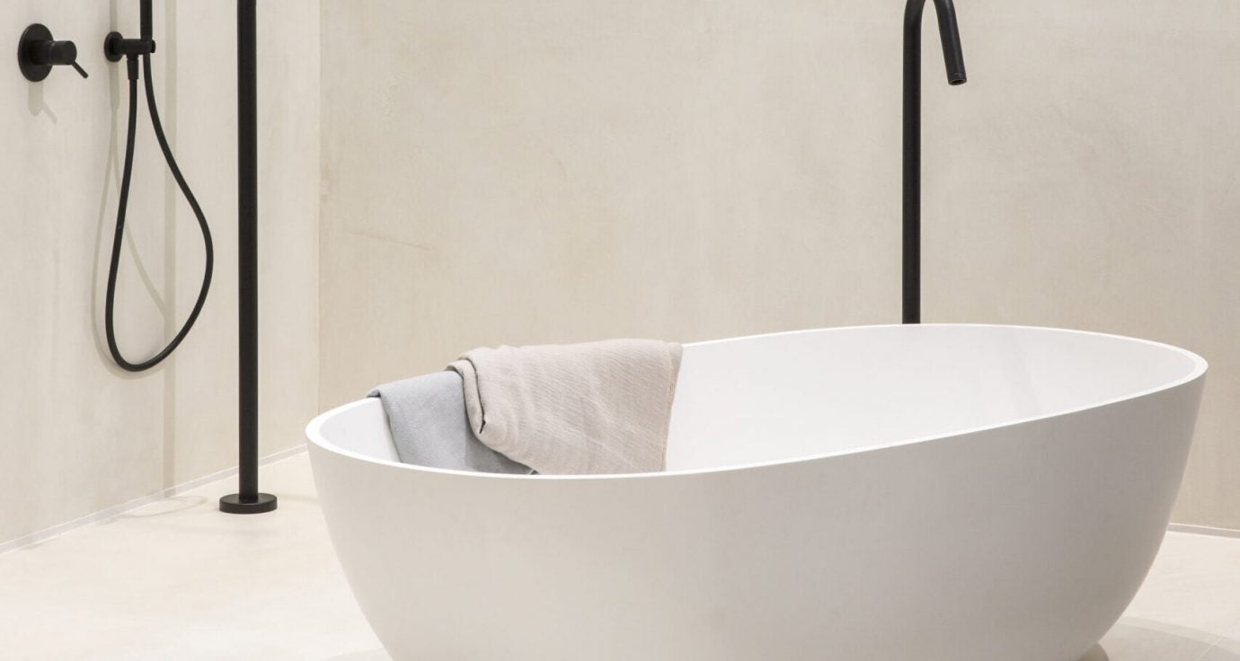 JEE-O slimline 01 free-standing mixer in a modern spa bathroom - ideal solution for hotels and architectural projects